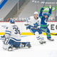 Bo Horvat (r.) celebrates after a game-winner against the Leafs.